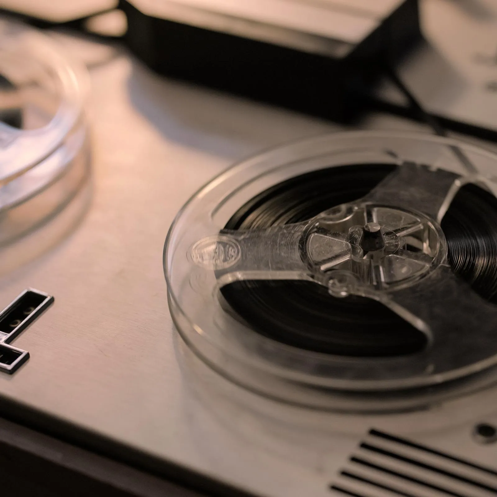 Open reel-to-reel tape recorder used for field recording folk songs
